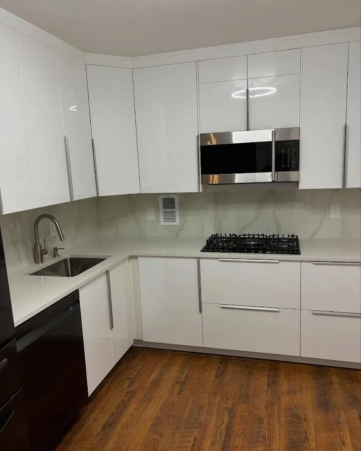 Restored kitchen with white cabinets after water damage in Calexico